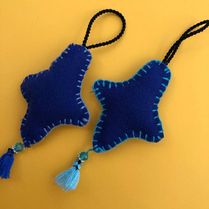 Estrellita | Adorno de fieltro hecho a mano, diseño original. Decoración Arbol de Navidad
