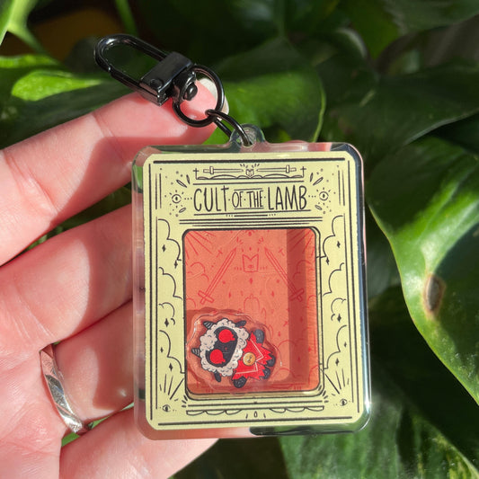 Shaker Cult of the Lamb | Tamagotchi Llavero Colgante
