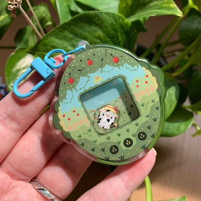 Llavero vaquita blanca | Tamagotchi shaker