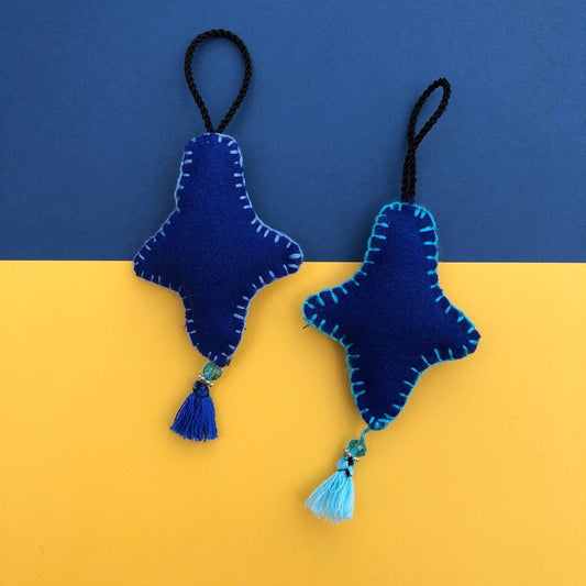 Estrellita | Adorno de fieltro hecho a mano, diseño original. Decoración Arbol de Navidad