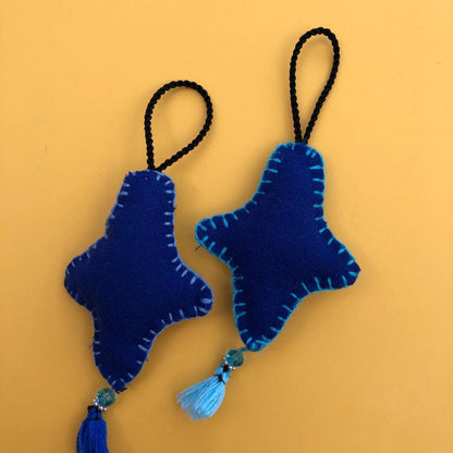 Estrellita | Adorno de fieltro hecho a mano, diseño original. Decoración Arbol de Navidad