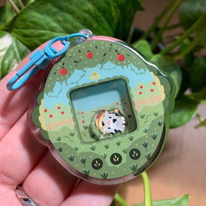 Llavero vaquita blanca | Tamagotchi shaker