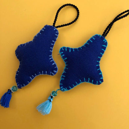 Estrellita | Adorno de fieltro hecho a mano, diseño original. Decoración Arbol de Navidad