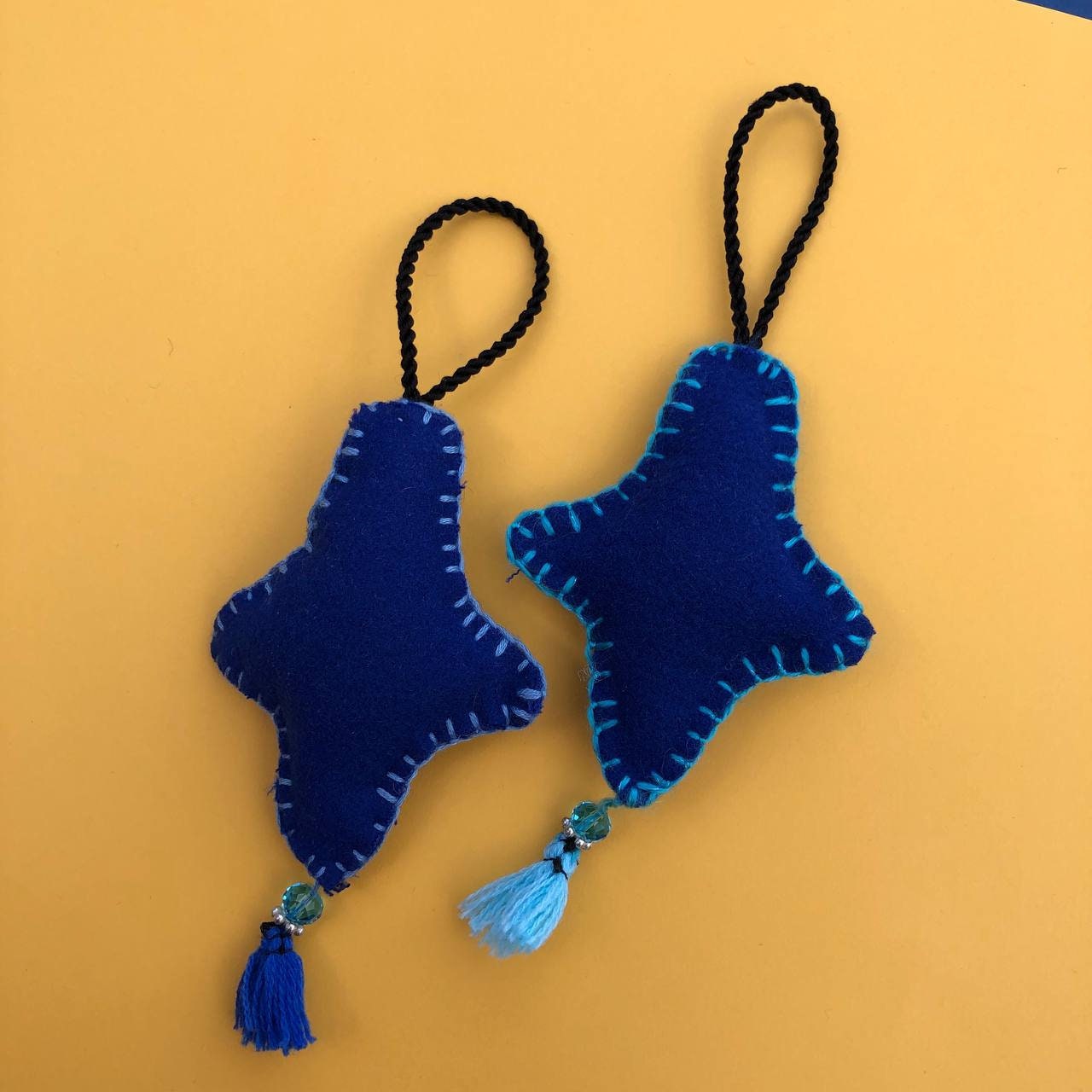 Estrellita | Adorno de fieltro hecho a mano, diseño original. Decoración Arbol de Navidad