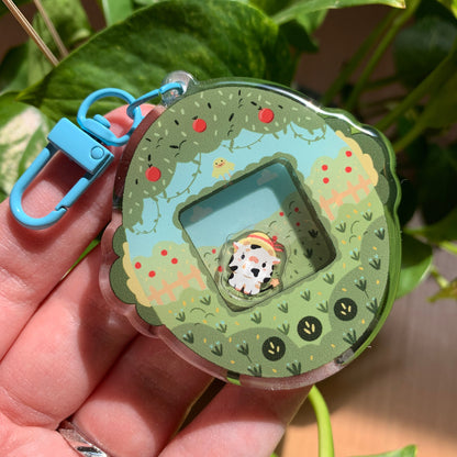 Llavero vaquita blanca | Tamagotchi shaker