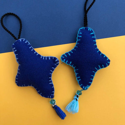 Estrellita | Adorno de fieltro hecho a mano, diseño original. Decoración Arbol de Navidad