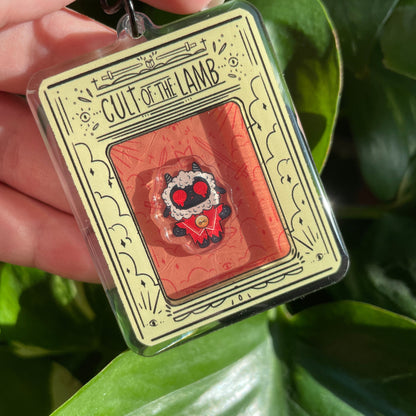 Shaker Cult of the Lamb | Tamagotchi Llavero Colgante